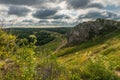 Hilly landscape withÃÂ a JurassicÃÂ limestone rock formation in Cracow-Czestochowa Upland, Olsztyn,ÃÂ Silesian Voivodeship,ÃÂ Poland Royalty Free Stock Photo